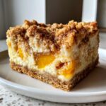 Peach Cobbler Cheesecake Bars